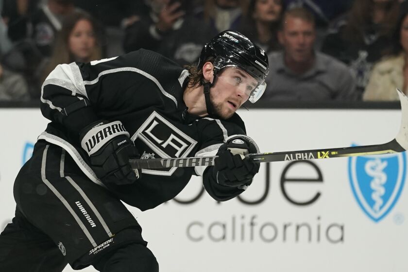 Los Angeles Kings center Adrian Kempe (9) passes during an NHL hockey game against the Seattle Kraken Saturday, March 26, 2022, in Los Angeles. (AP Photo/Ashley Landis)