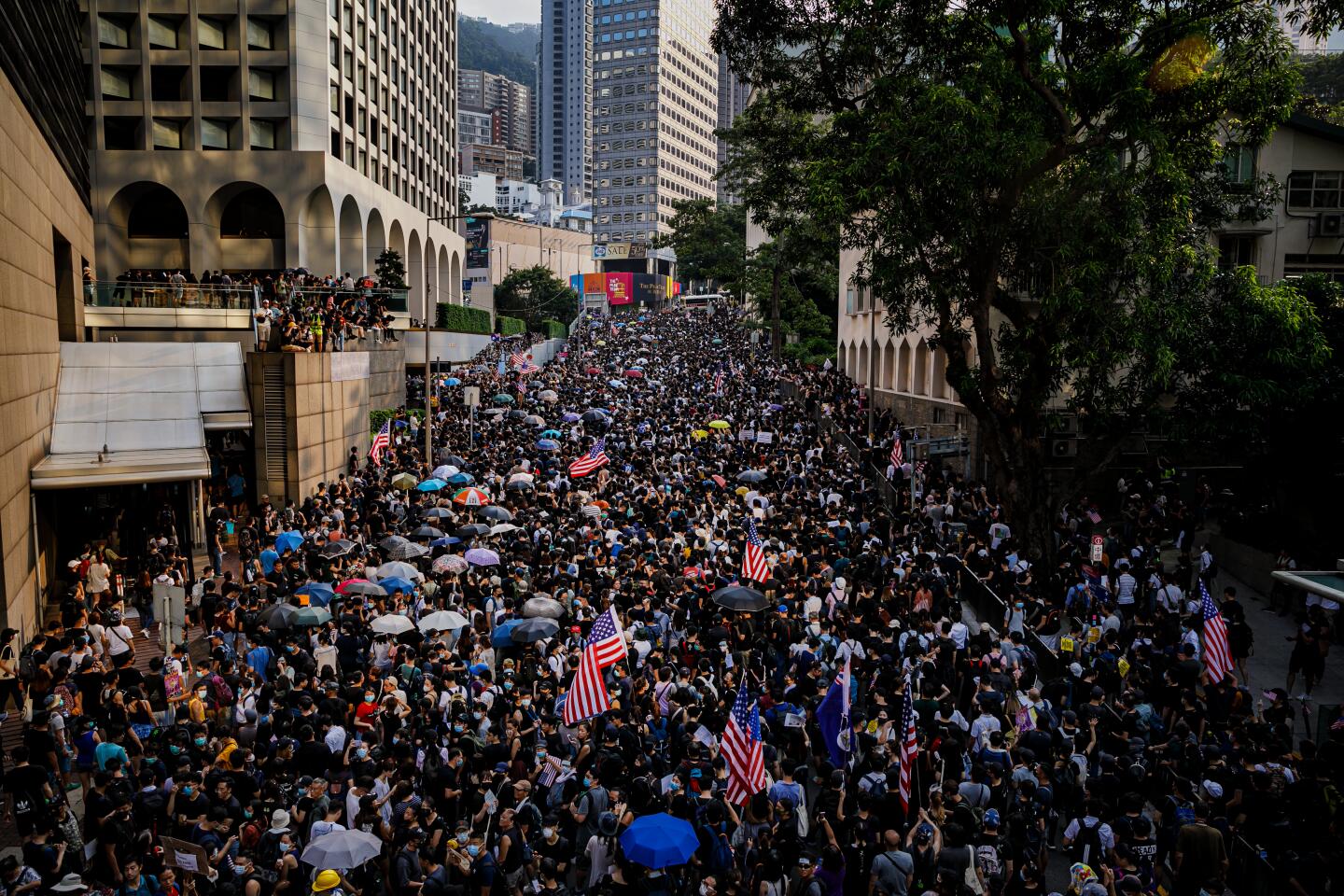 HONG KONG, CHINA -- SUNDAY, SEPTEMBER 8, 2019: Demonstrators march uphill towards the United States Consulate for a pro-democracy rally in Hong Kong, on Sept. 8, 2019. (Marcus Yam / Los Angeles Times)
