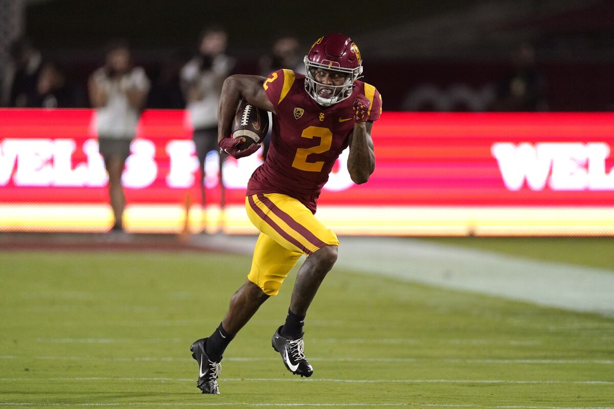 USC wide receiver Brenden Rice runs the ball during a win over Arizona State on Oct. 1.