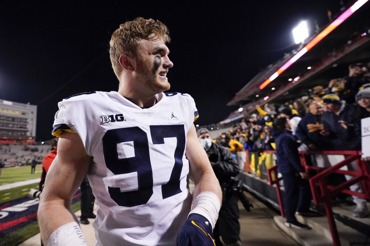 Michigan defensive end Aidan Hutchinson looks on after a game against Maryland.