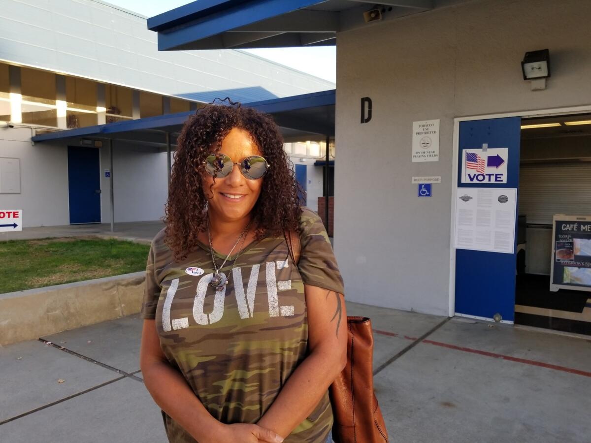 Cat Reese, 53, casts a ballot at Fern Drive Elementary School in Fullerton.