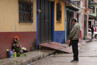 A man prays in front of an altar where Catholic priest Marcelo Perez died in an armed attack after attending mass at a church in San Cristobal de las Casas, Chiapas state, Mexico, Sunday, Oct. 20, 2024. (AP Photo/Isabel Mateos)