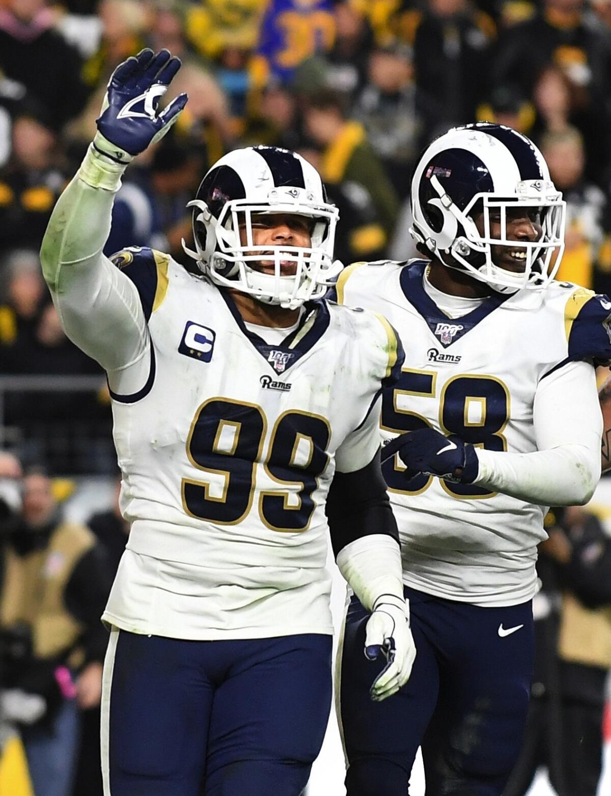 Rams defensive lineman Aaron Donald (99) celebrates a defensive play against the Chicago Bears.