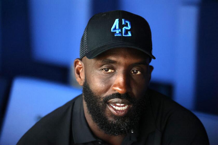 WESTWOOD, CA - AUGUST 15, 2024 - New UCLA Bruins football coach DeShaun Foster inside the Wasserman Football Center at UCLA on August 15, 2024. Foster, who played college football with UCLA earning second-team All-American honors in 2001. He played professionally with the Carolina Panthers and the San Francisco 49ers. He was inducted into the UCLA Athletics Hall of Fame in 2022.(Genaro Molina/Los Angeles Times)