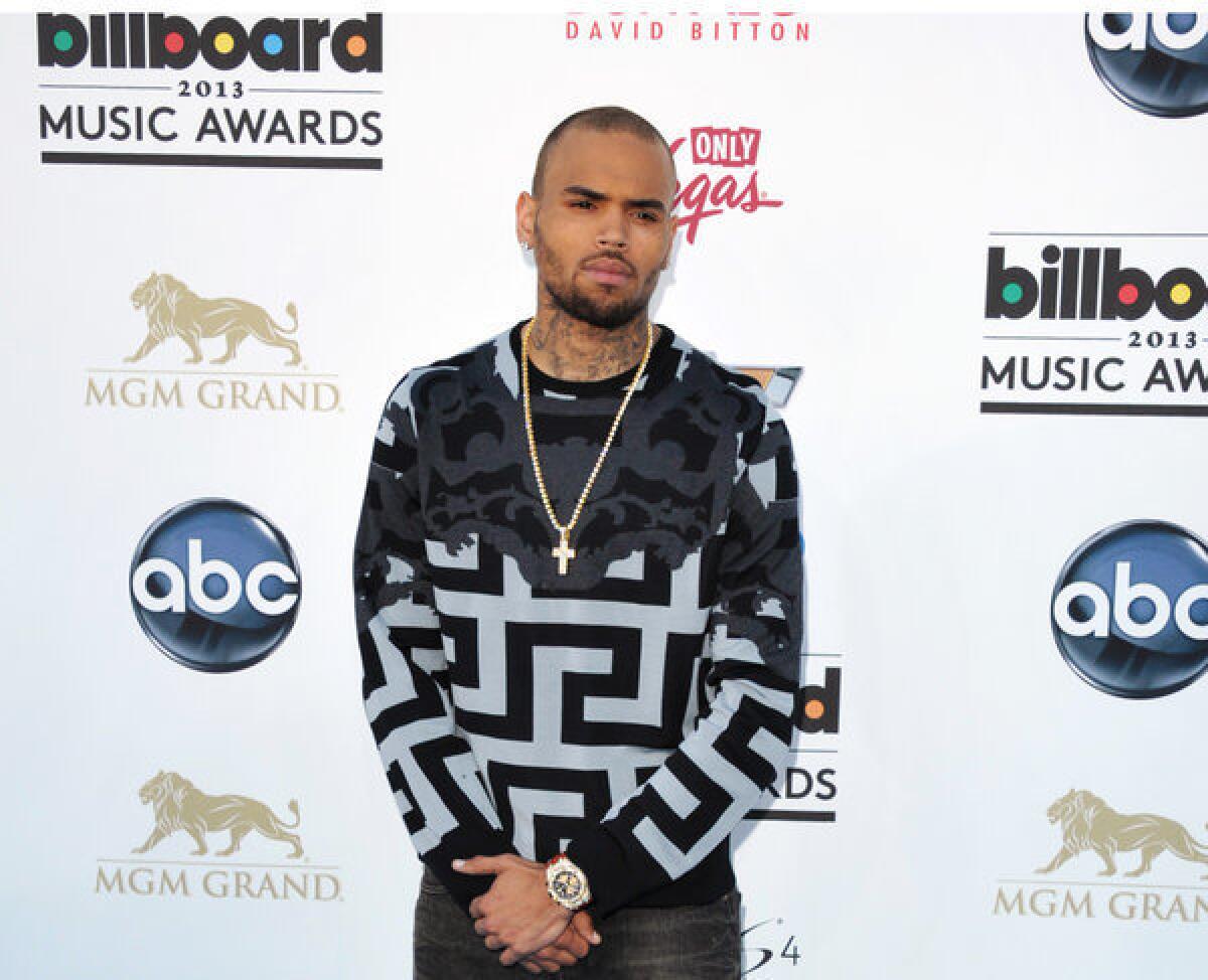 Chris Brown arrives at the Billboard Music Awards at the MGM Grand Garden Arena in Las Vegas.