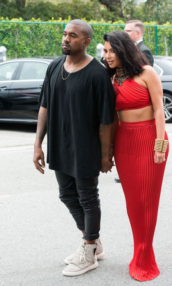 Kanye West and Kim Kardashian arrive at the Roc Nation Pre-Grammy brunch on Feb. 7, 2015, in Beverly Hills.