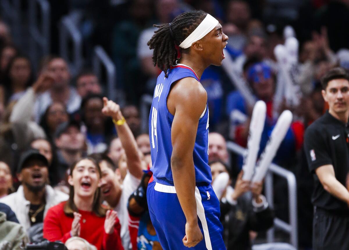 Clippers guard Terance Mann reacts after blocking a shot during a game against the Celtics last season.