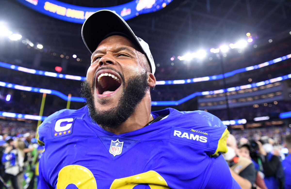 Rams defensive lineman Aaron Donald celebrates after the NFC championship game on Sunday.