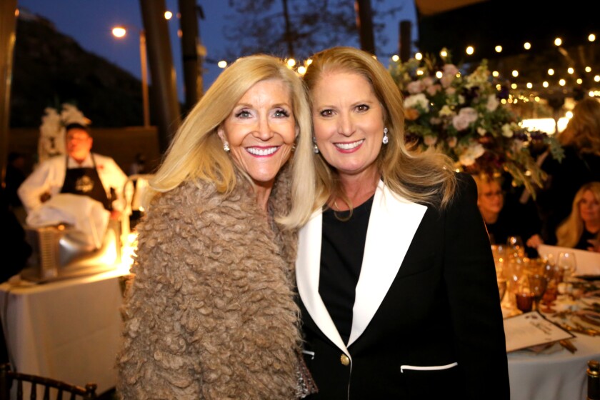 Title Sponsor Mary Murfey, left, with Kristin Martin, Table for 10 founder and director.