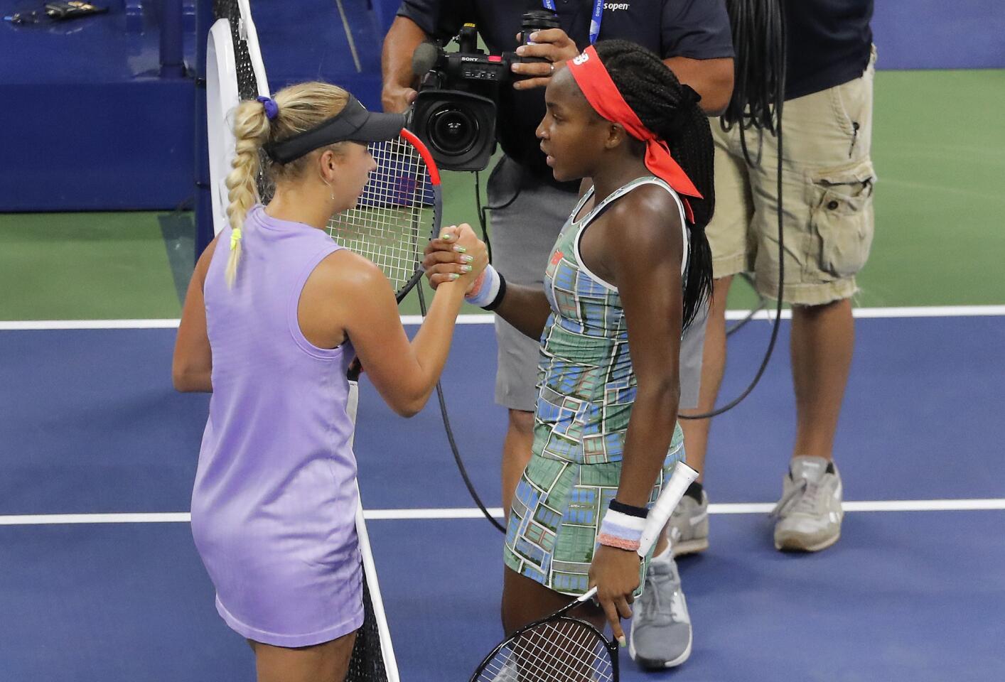 Coco Gauff, right, greets Anastasia Potapova after winning their match at the 2019 U.S. Open on Aug. 27, 2019, in Queens.