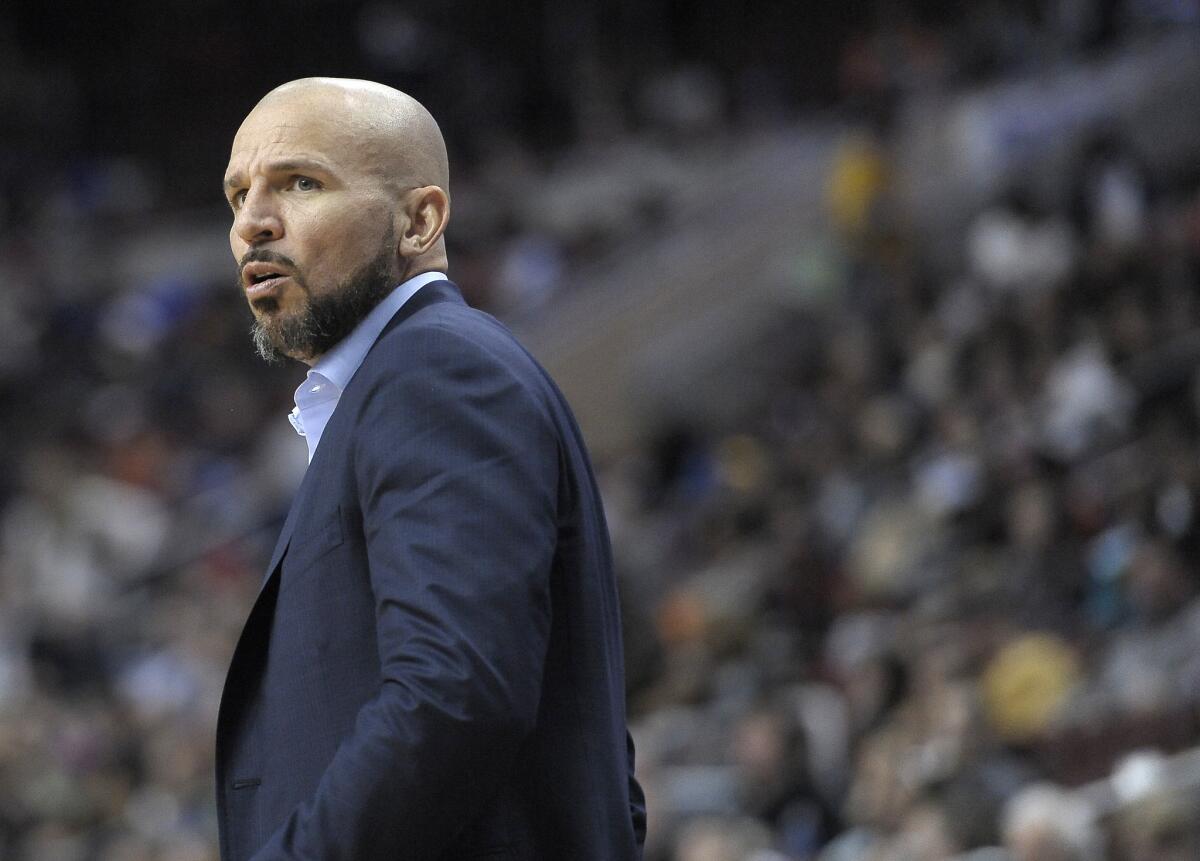 Brooklyn Nets Coach Jason Kidd watches his team play the Philadelphia 76ers on April 5.