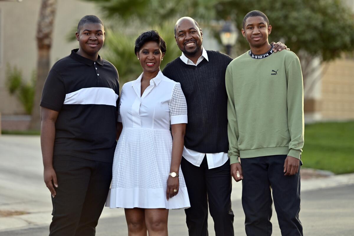 Christian Shelton, his mother, father and older brother