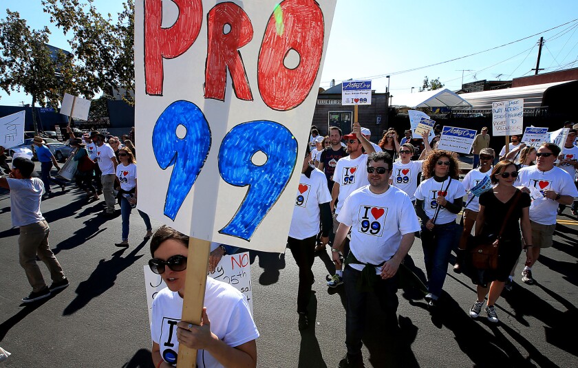 Members of the Actors' Equity Assn. are out in force in North Hollywood in March to protest a proposal recently announced by their union to end the 99-seat Theater Plan in Los Angeles.