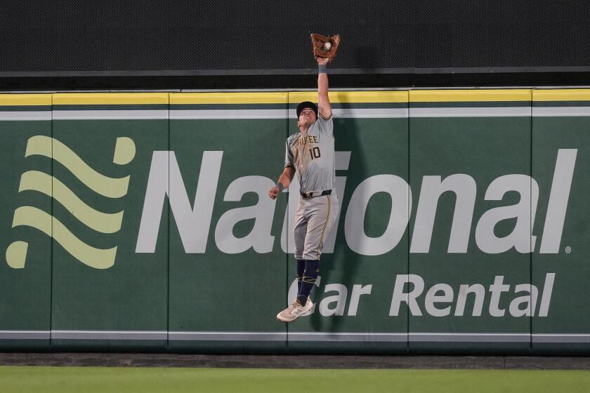 Milwaukee Brewers center fielder Sal Frelick catches a fly ball hit by Los Angeles Angels' Taylor Ward for the final out of a baseball game Tuesday, June 18, 2024, in Anaheim, Calif. (AP Photo/Ryan Sun)