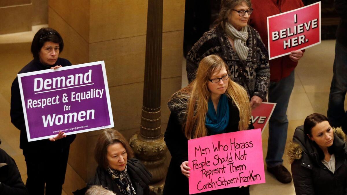Women rally at the Minnesota Capitol on Friday in response to sexual harassment allegations against Sen. Al Franken and other prominent figures.