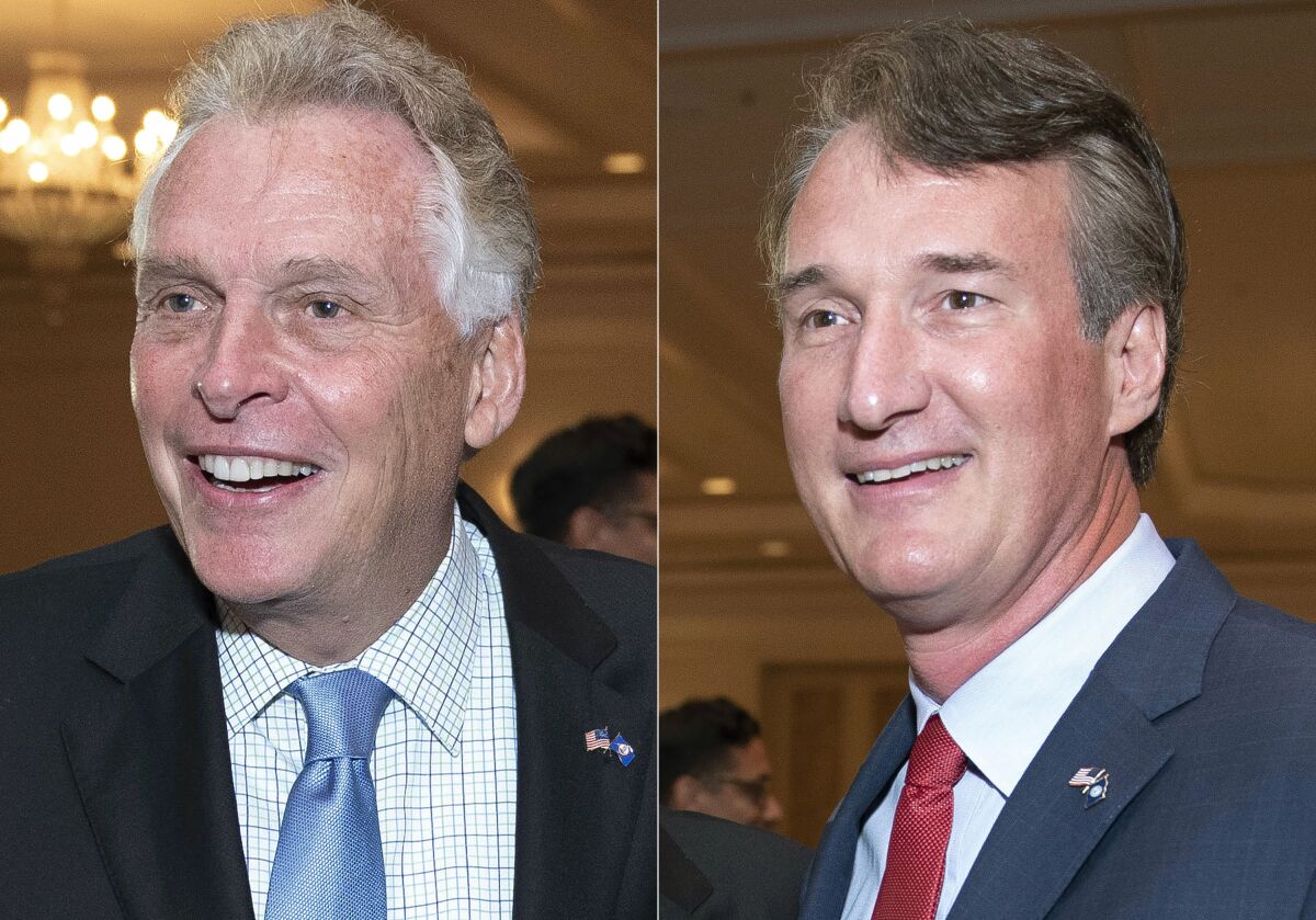 In this combination photo, Virginia gubernatorial candidates, Democrat Terry McAuliffe left, and Republican Glenn Youngkin appear during the Virginia FREE leadership luncheon, in McLean, Va., on Sept. 1, 2021. When Donald Trump rallied Republicans this week to vote for Glenn Youngkin for governor in Virginia, the former president called into a rally of diehard supporters. That may be the closest he gets to campaigning in the most closely-watched election of 2021(AP Photo/Cliff Owen)
