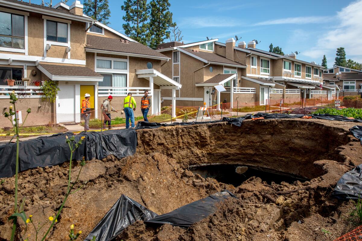 A March photo of the collapsed storm drain channel at Coyote Village in La Habra.