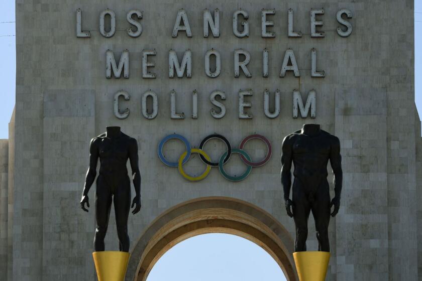An Olympic themed monument stands at the Los Angeles Memorial Coliseum after rival Budapest dropped its bid for the 2024 Olympics, in Los Angeles, California on February 22, 2017. Budapest has became the latest city to drop out of the race to host the 2024 Olympic Games, after a petition garnered enough signatures to force a referendum on their bid. / AFP PHOTO / Mark RALSTONMARK RALSTON/AFP/Getty Images ** OUTS - ELSENT, FPG, CM - OUTS * NM, PH, VA if sourced by CT, LA or MoD **