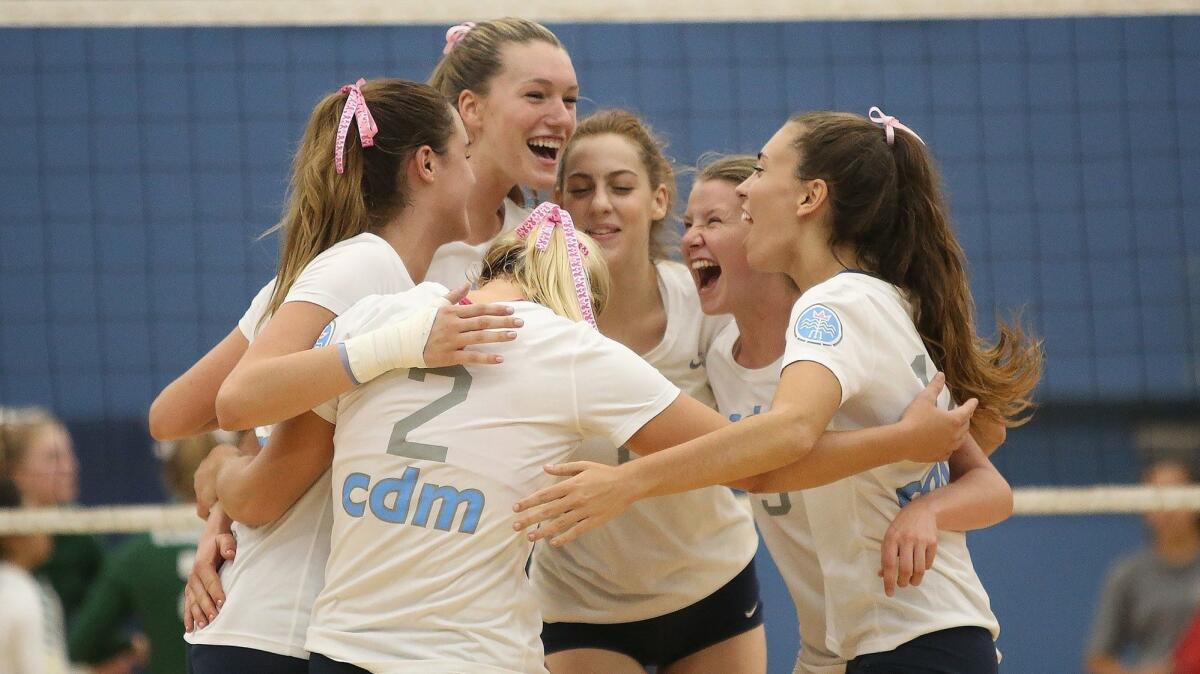Corona del Mar High, shown celebrating a point against Edison on Oct. 2, earned a No. 2 seed in the CIF Southern Section Division 2 girls' volleyball playoffs.