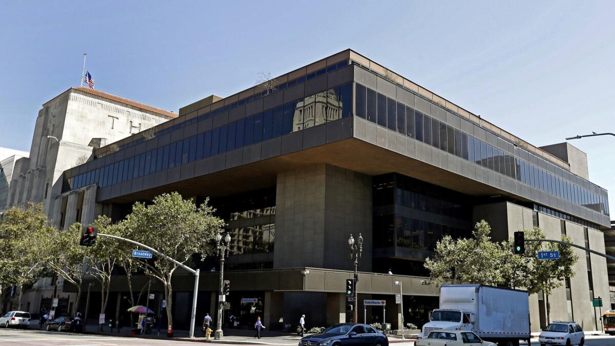 Preservationists applied for city landmark status for the former Times-Mirror headquarters at the corner of 1st Street and Broadway in downtown Los Angeles. The 1973 portion designed by William Pereira is in the foreground.