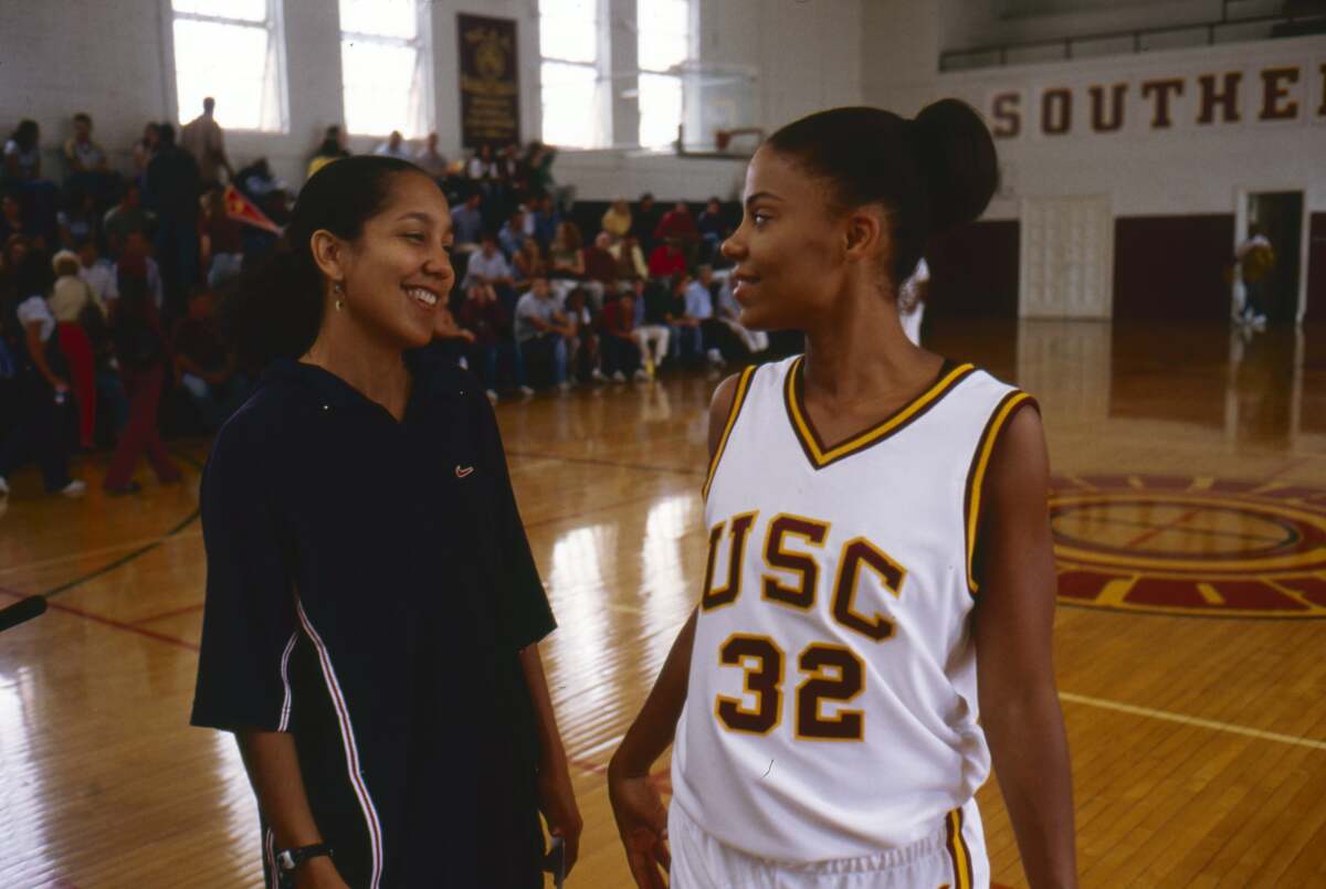 From left, writer-director Gina Prince-Bythewood with Sanaa Lathan on the set of 2000's "Love & Basketball."