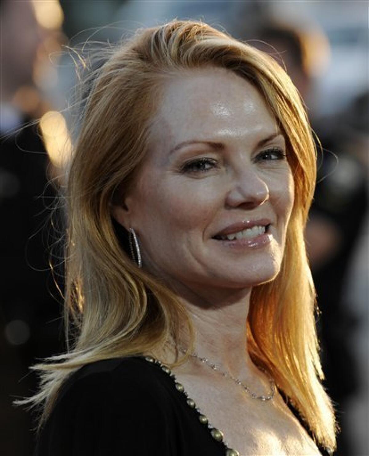 In this Sept. 17, 2008 file photo, Marg Helgenberger arrives at the premiere of the film "Appaloosa" at the Academy of Motion Picture Arts and Sciences in Beverly Hills, Calif. (AP Photo/Chris Pizzello, File)