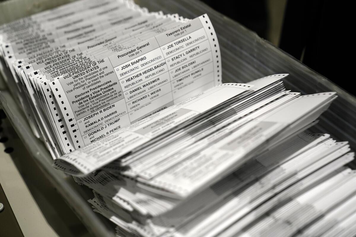 Ballots in a bin at Philadelphia's mail-in ballot sorting and counting center. 