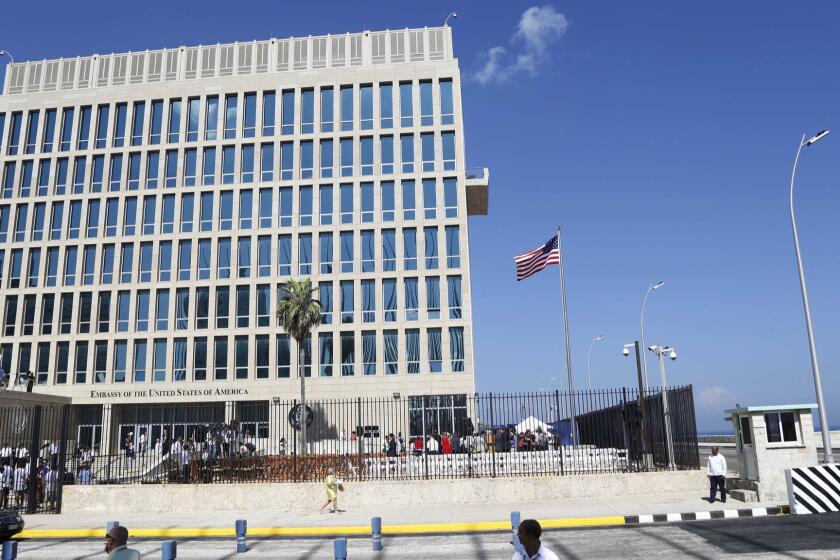 FILE - This Aug. 14, 2015 file photo shows the U.S. embassy in Havana, Cuba. Cuba released details Sunday, June 10, 2018 on the latest mysterious health incident involving a U.S. diplomat in the country, saying officials learned of the episode late May 2018 when the U.S. said an embassy official felt ill after hearing âundefined soundsâ in her home. U.S. officials said June 8, 2018 that they had pulled two workers from Cuba and were testing them for possible brain injury. (AP Photo/Desmond Boylan, File)