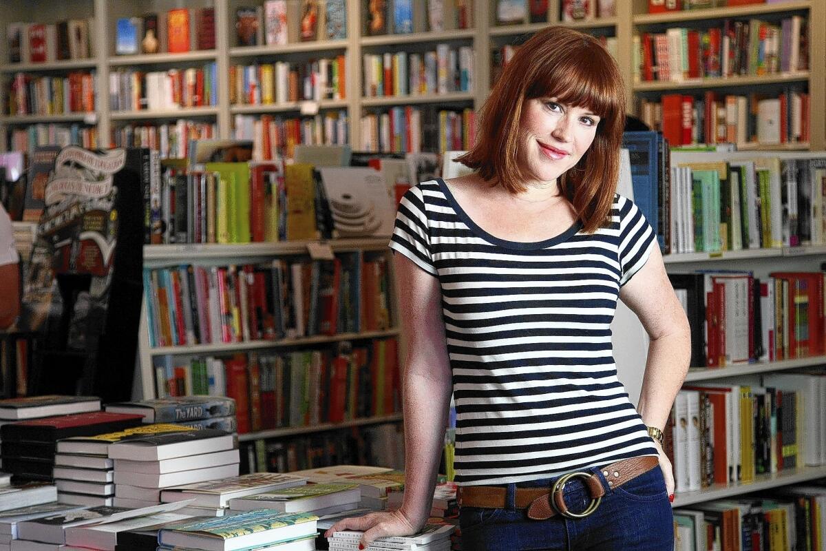 Actress Molly Ringwald, one of the stars of the new movie "Jem and the Holograms," appears at a book-signing event in Brentwood in 2012.