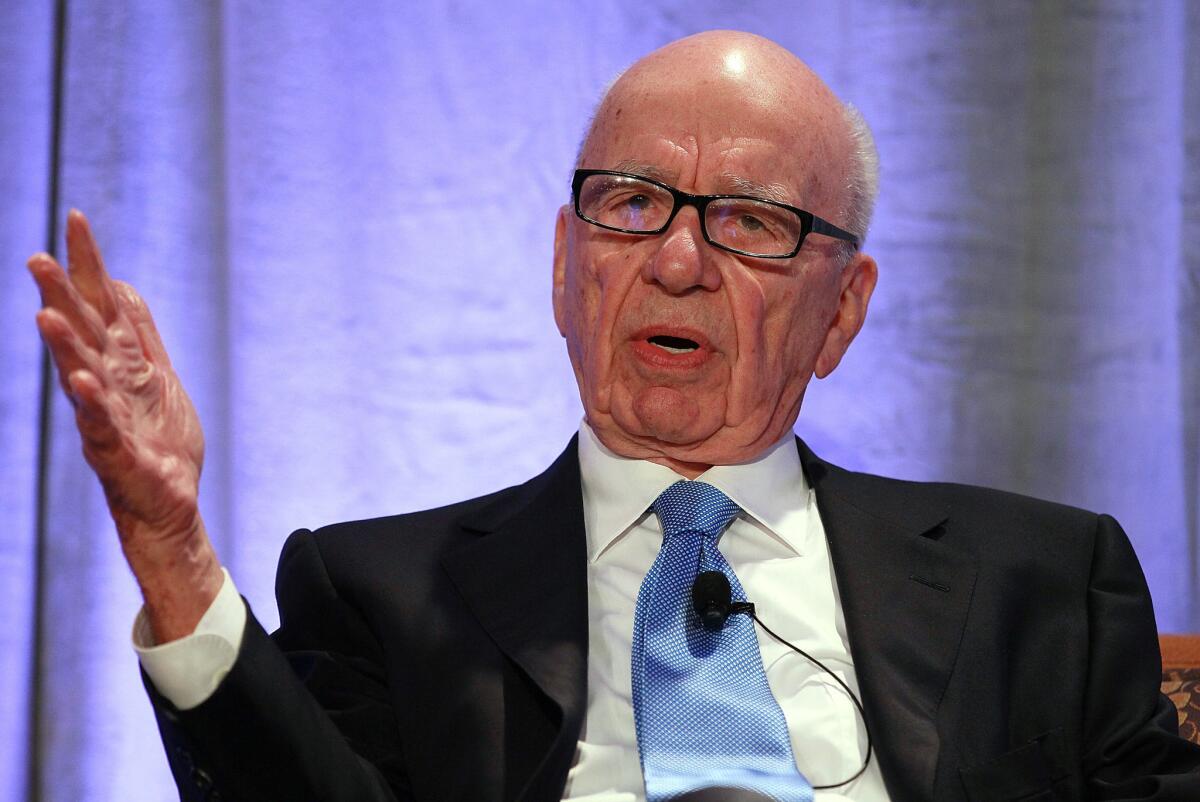 "21st Century Fox is a name that draws upon the rich creative heritage of Twentieth Century Fox, while also speaking to the innovation and dynamism that must define each of our businesses through the 21st Century," Murdoch said in an email message announcing the name of his soon-to-be-reconstituted film and television company. Above, Murdoch in October 2011.