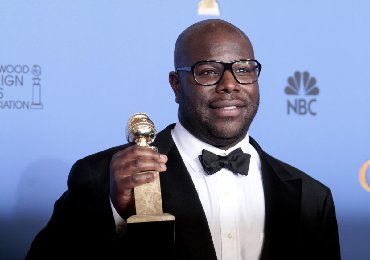 Director Steve McQueen, with his Golden Globe for "12 Years a Slave," thanked his wife for bringing the book to his attention.