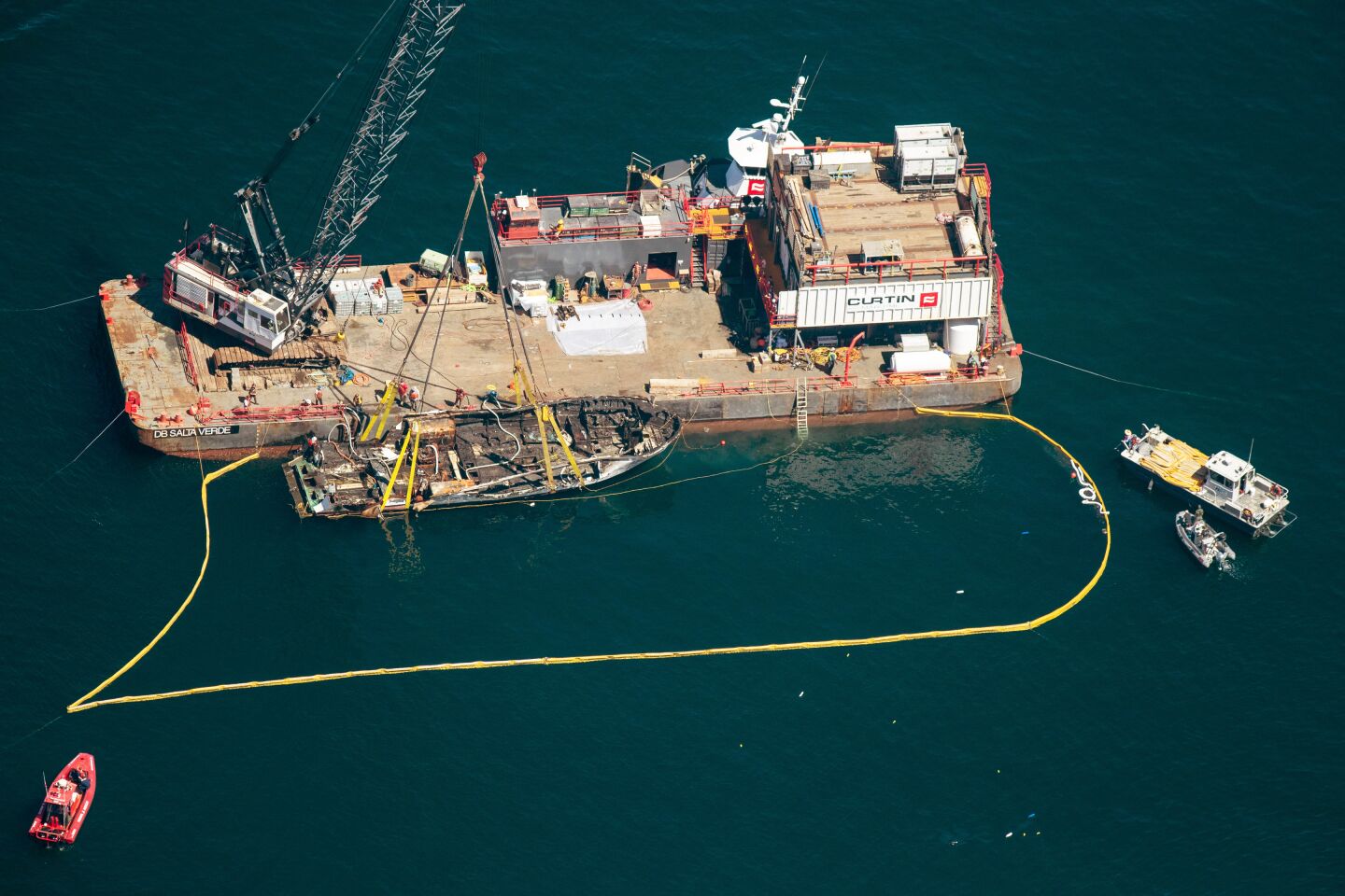 The burned hulk of the Conception is brought to the surface by a salvage team off Santa Cruz Island.