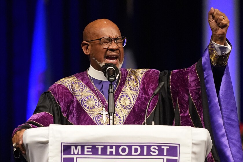 Bishop Wilfred T. Messiah delivers an invocation during the opening worship service at the African Methodist Episcopal Church conference Tuesday, July 6, 2021, in Orlando, Fla. (AP Photo/John Raoux)