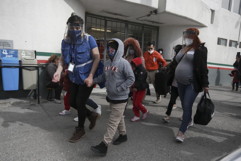 A migrant family crosses the border, Feb 26 from Ciudad Juarez, Mexico, into El Paso. 