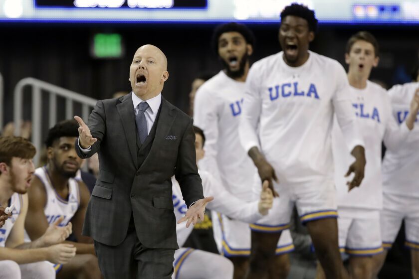 FILE - In this Thursday, Feb. 13, 2020, file photo, UCLA coach Mick Cronin argues a call during.