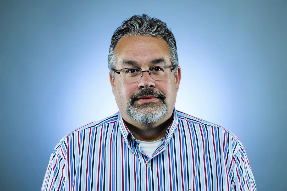Russ Newton was named publisher of Times Community News.