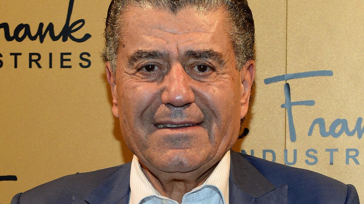 Univision, which is owned by several private equity firms and Los Angeles billionaire Haim Saban, pictured, had been planning to raise about $1 billion through a partial offering of its shares.