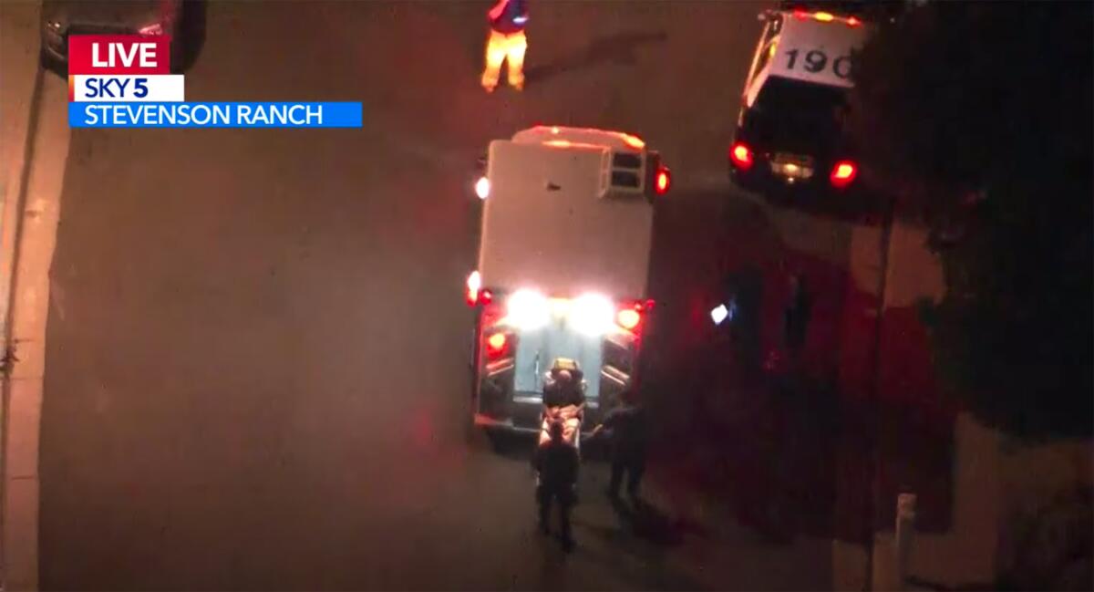 An aerial view of an ambulance at night.