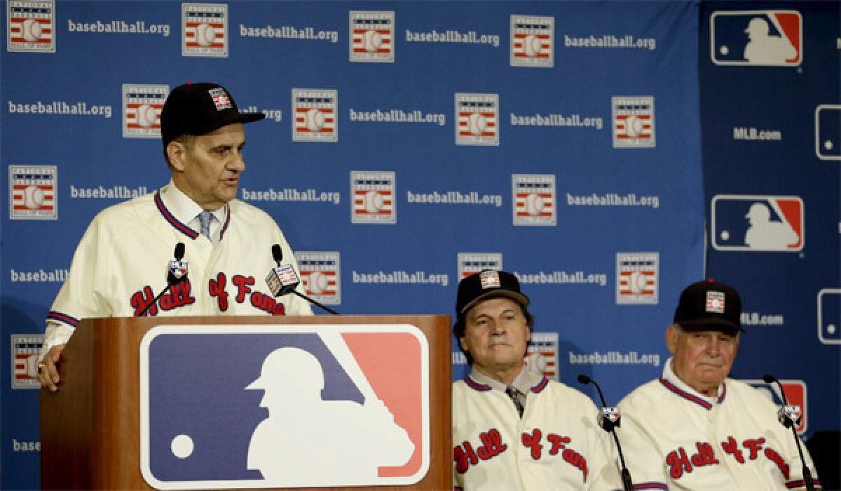 Joe Torre, Tony La Russa and Bobby Cox (left to right) were unanimously selected to join the baseball Hall of Fame on Monday.