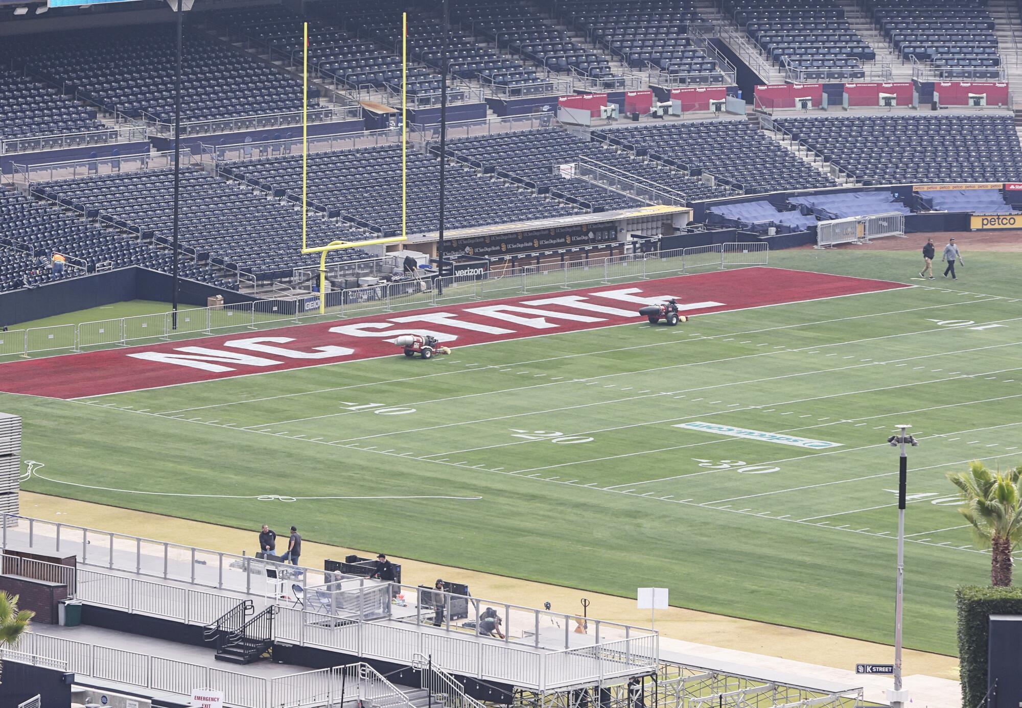 Preparations for the upcoming Holiday Bowl continue at Petco Park on Wednesday.