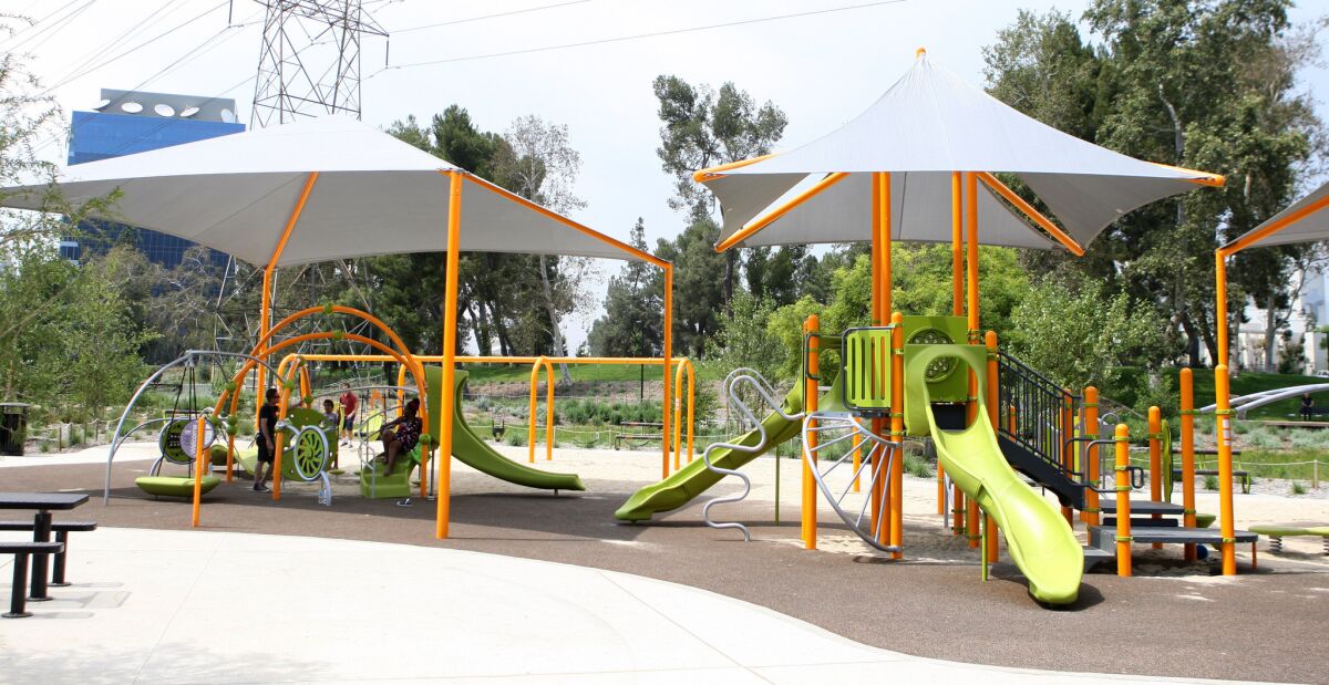 New playground equipment at Johnny Carson Park on Tuesday, June 28, 2016.
