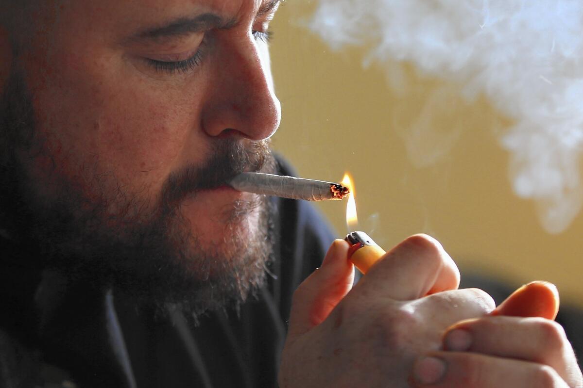 The 2016 election promises to be an expensive one for the legalization movement, with ballot measures likely in California, Nevada, Maine and Massachusetts. Above, former U.S. Marine Sgt. Ryan Begin smokes medical marijuana at his home in Belfast, Maine.