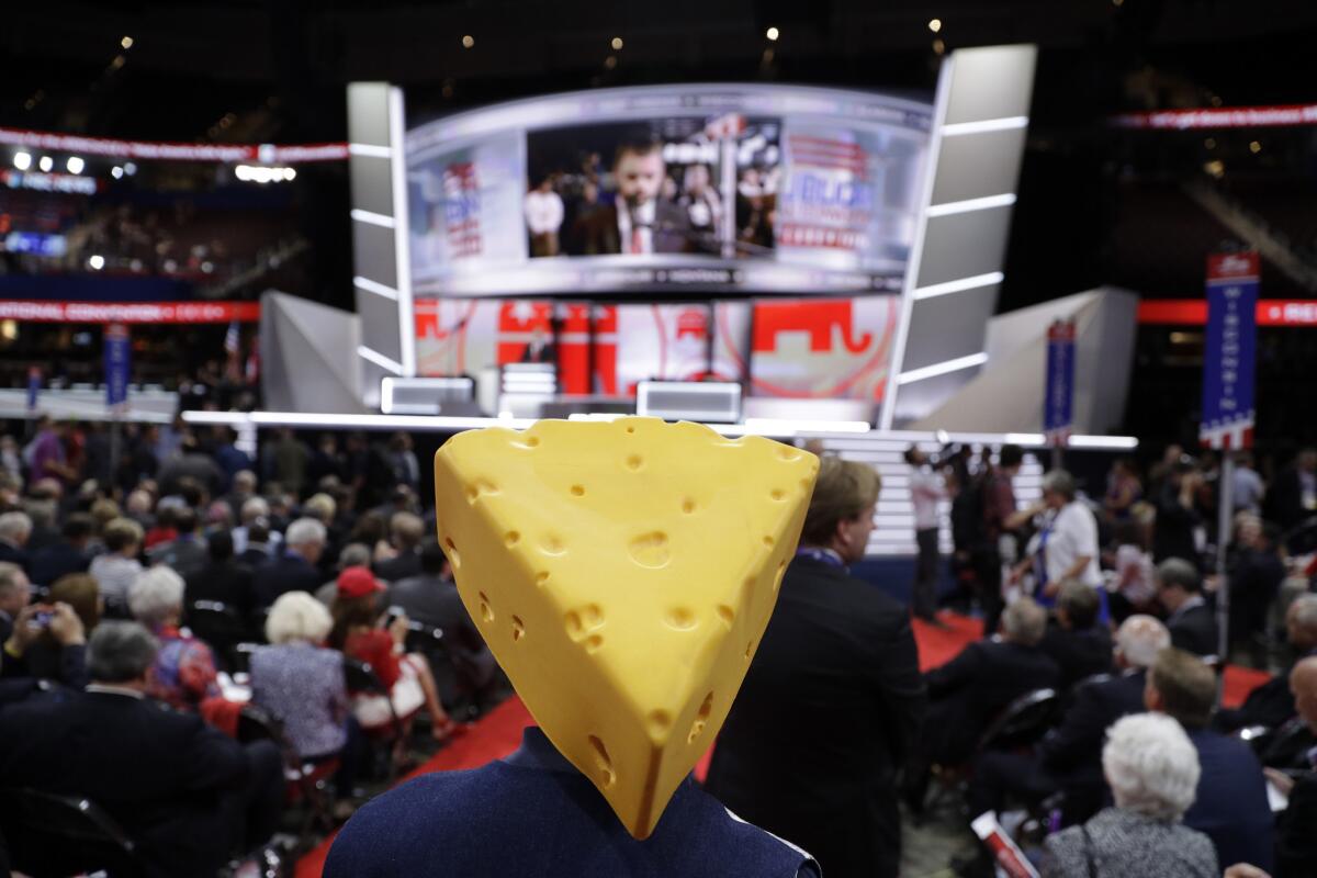 Barbara Finger from Oconto, Wis., wears a cheesehead hat during first day of the Republican National Convention in Cleveland.