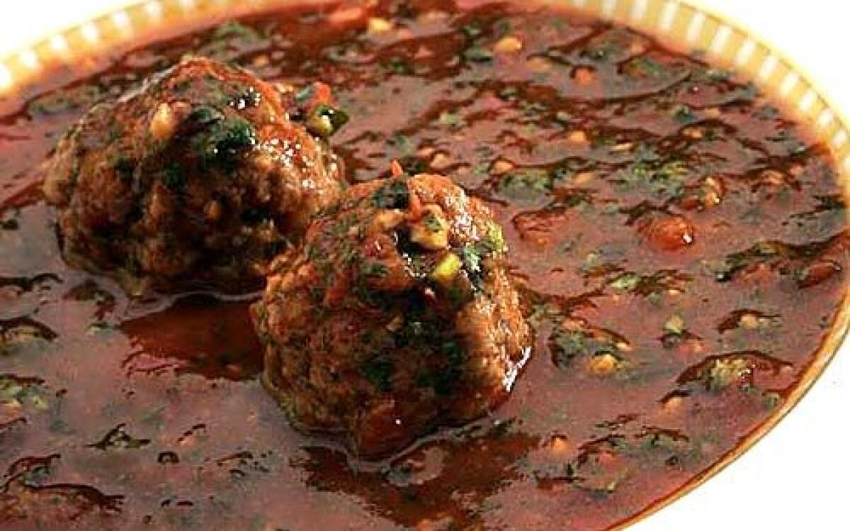 Spicy meatballs with adjika and yogurt