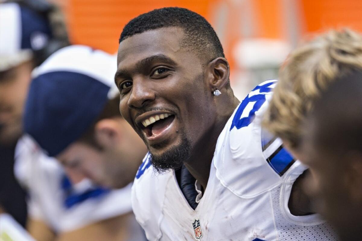 Dallas Cowboys Dez Bryant surprises customers at Walmart with PlayStation 4s.