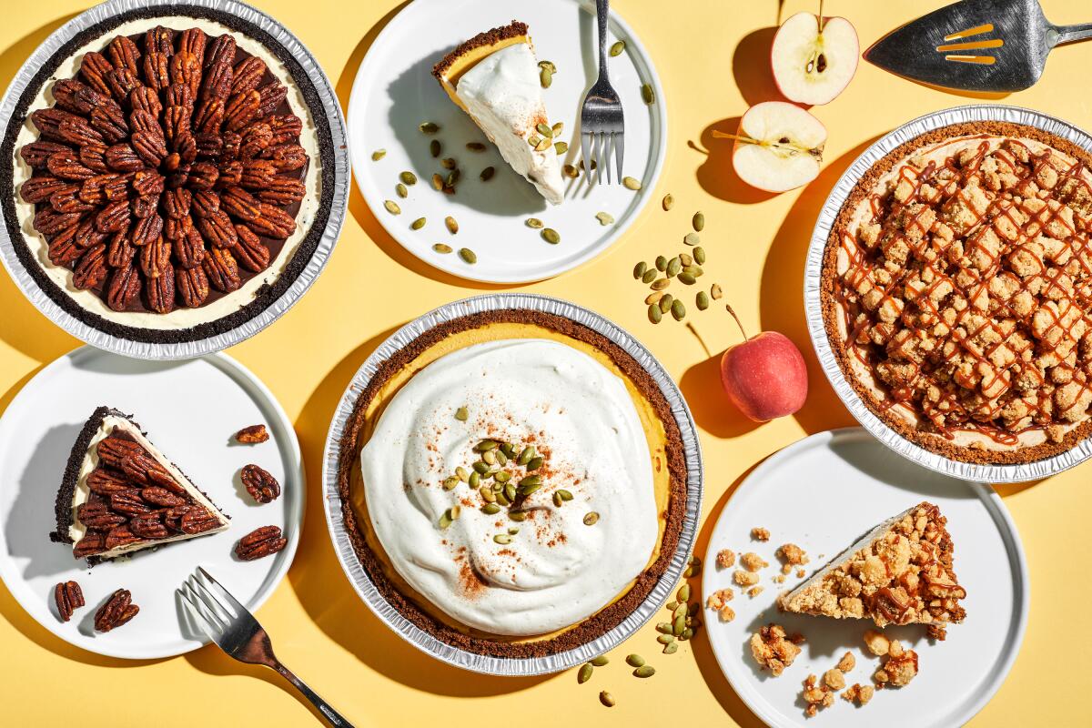 Three Sweet Rose Creamery ice cream pies and slices on plates against a pale yellow background