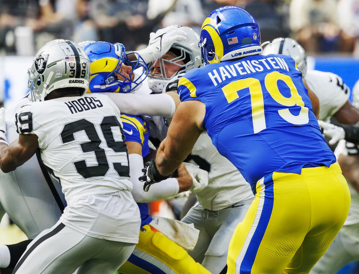  Rams quarterback Matthew Stafford (9) is sacked by  Raiders defensive end Maxx Crosby (98).