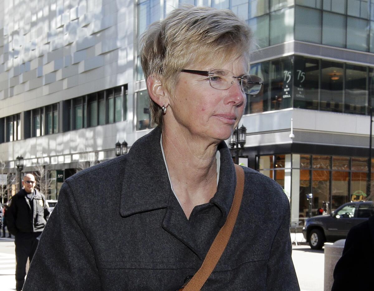 Donna Heinel arrives at federal court in Boston.