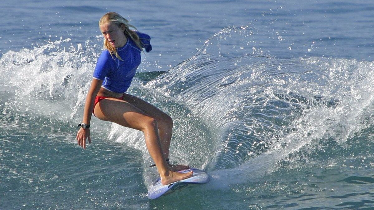 Bethany Hamilton resumed surfing after losing her arm in a shark attack.