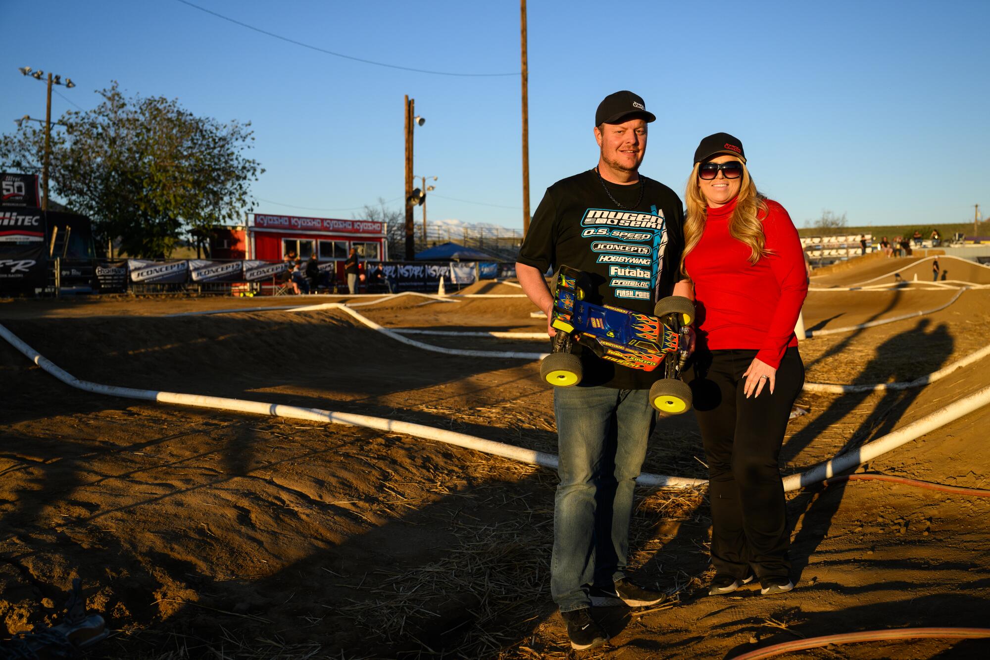 Adam Drake, left, and his wife, Ronda, pose for a portrait